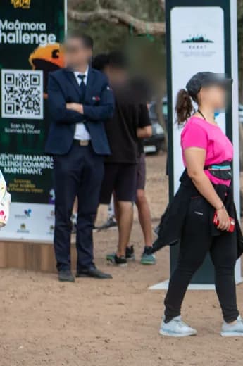 A Maamora Challenge signage totem carrying the QR code that opened the game.